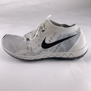 Nike women’s free 3.0 flyknit running shoes. Size 6 White And Gray.